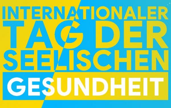 Blau gelbe Tafel mit Text Internationaler Tag der seelischen Gesundheit