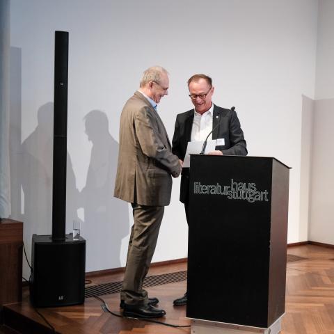 Müller und Hartmann Herr Müller und Herr Hartmann am Rednerpult